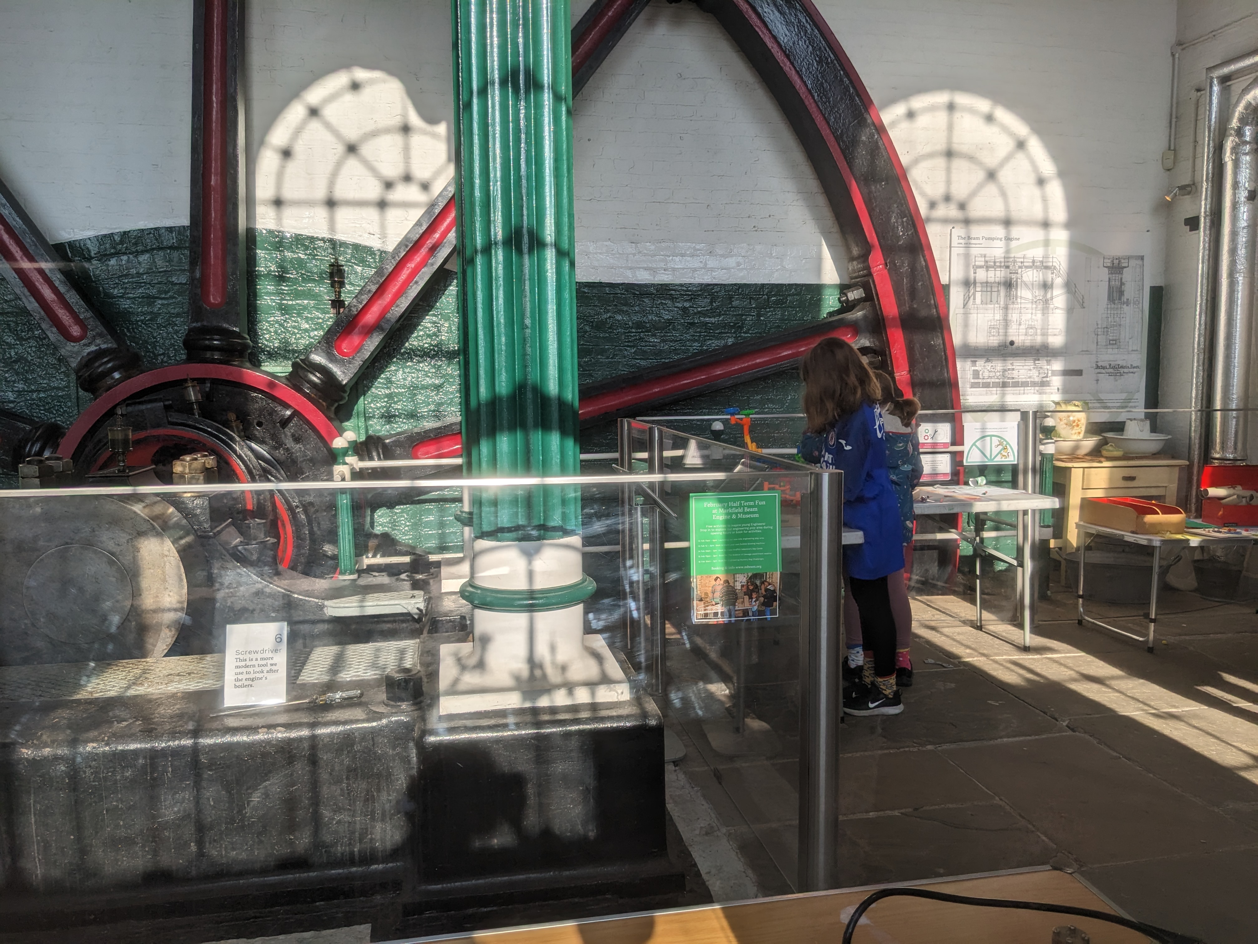 Children watching the great flywheel